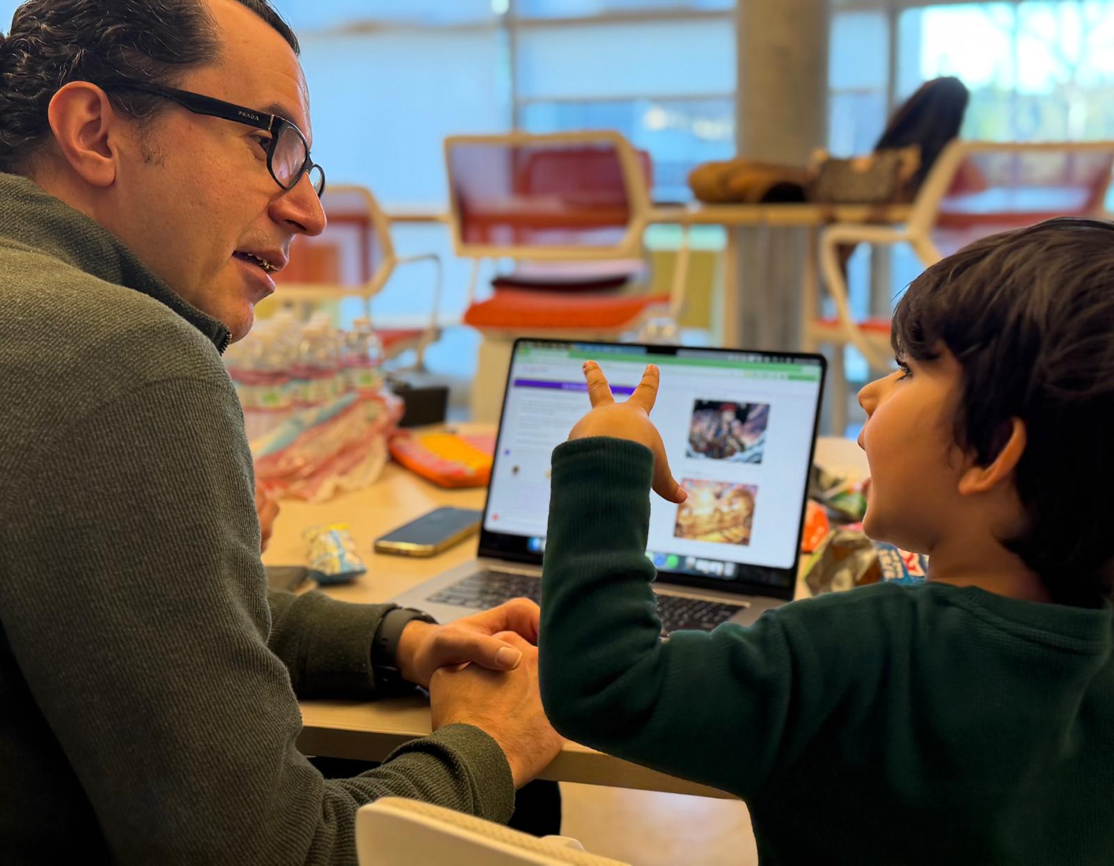 Parent and child sharing a creative moment