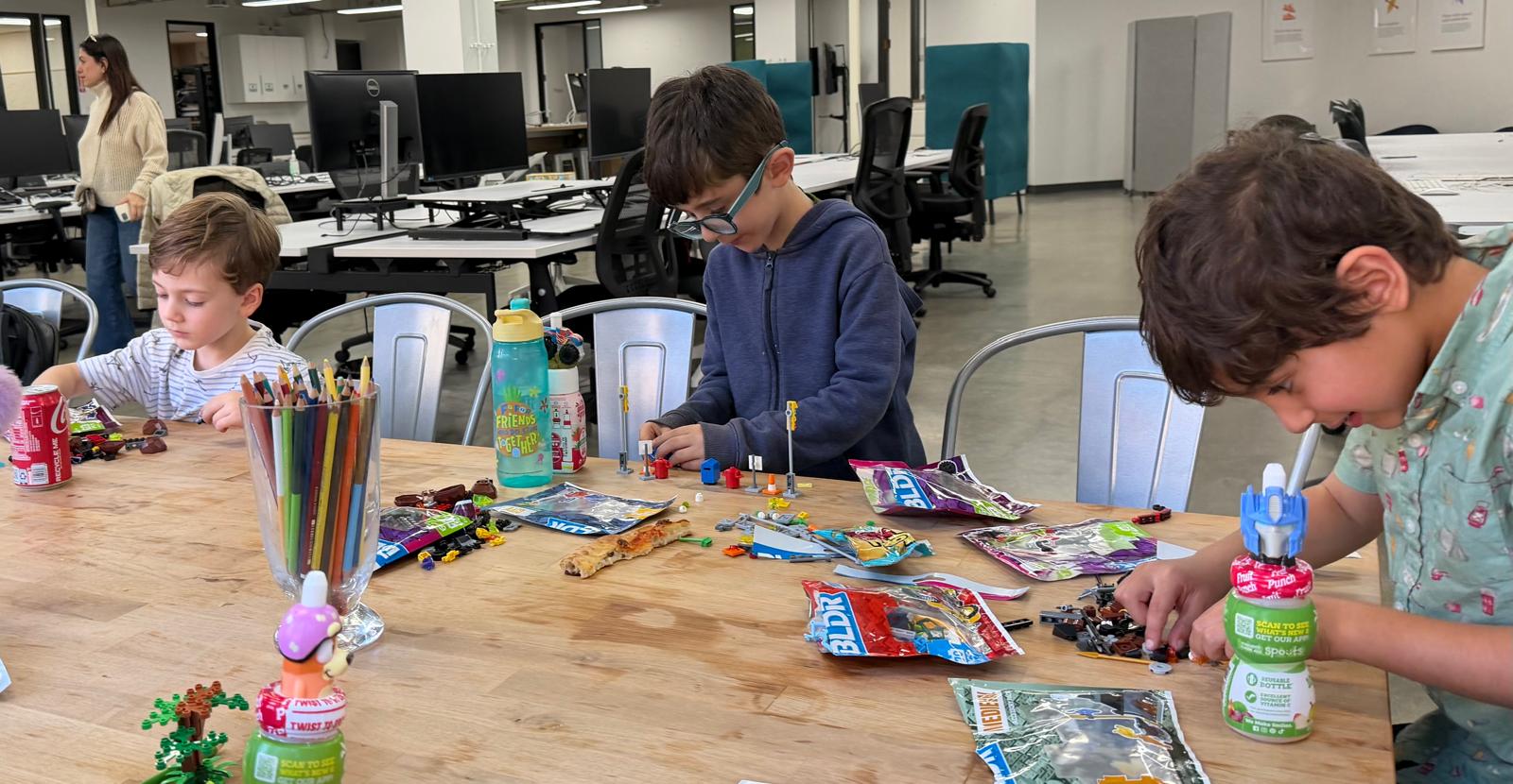 Kids with art supplies after the session